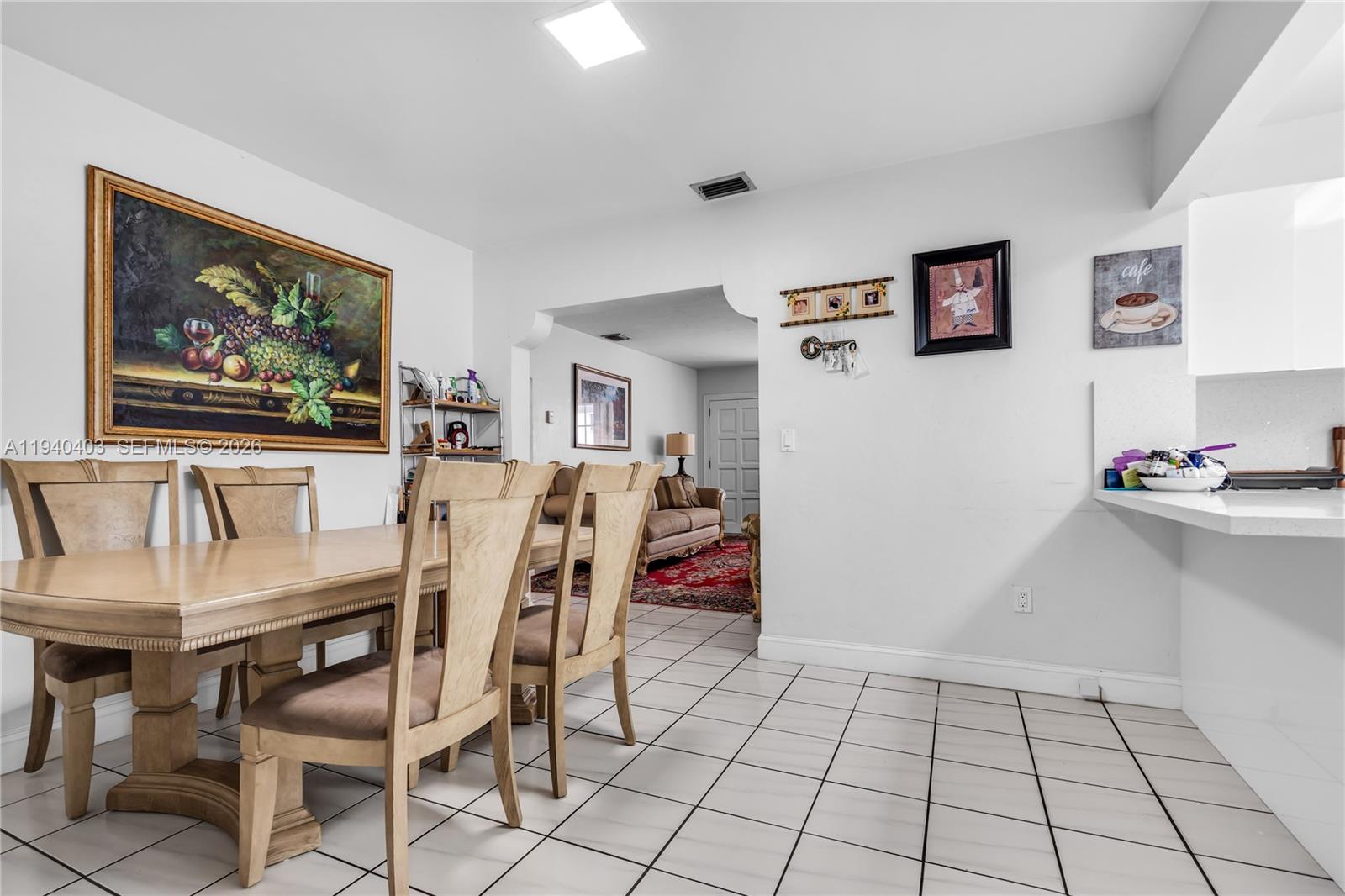 2145 Southwest 26th Street Miami, FL 33133 - Photo 9 of 26 a view of a livingroom with furniture and workspace