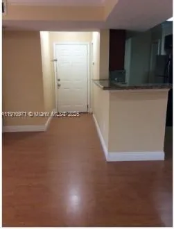 a view of a kitchen with utility area