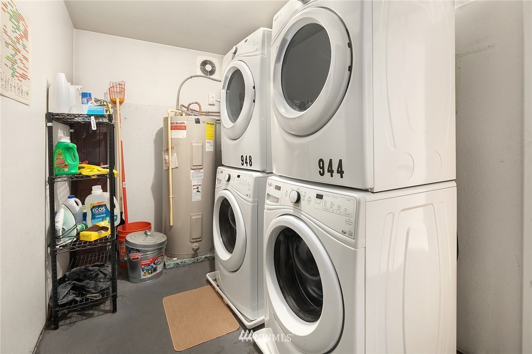 946 North 89th Street Seattle, WA 98103 - Photo 12 of 16 a utility room with dryer and washer