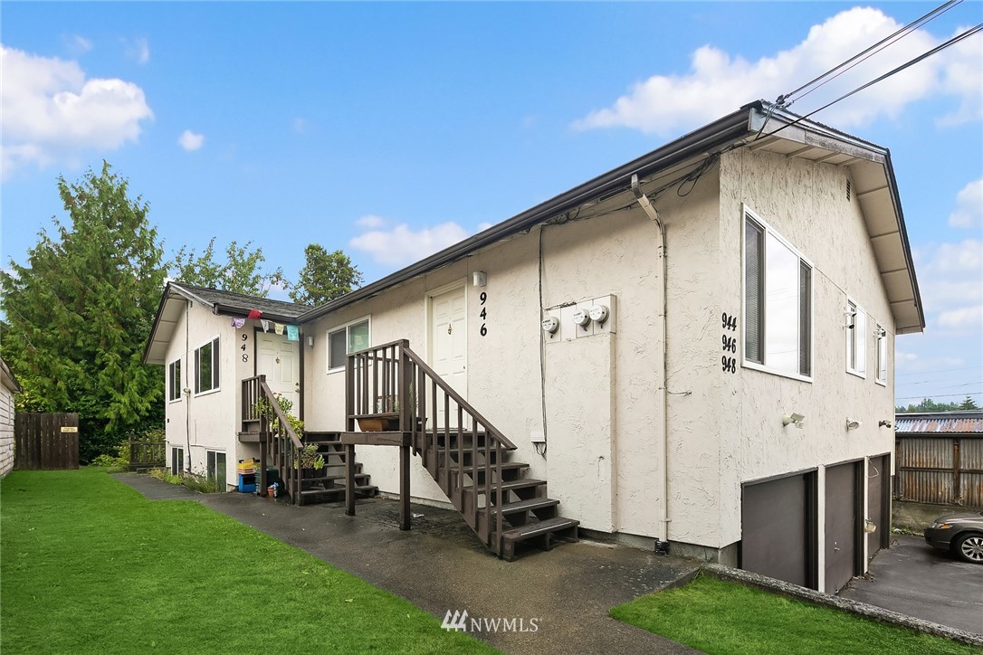 946 North 89th Street Seattle, WA 98103 - Photo 16 of 16 a view of a house with a yard