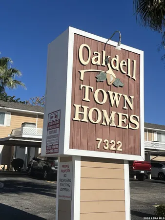 a view of a street sign of a building