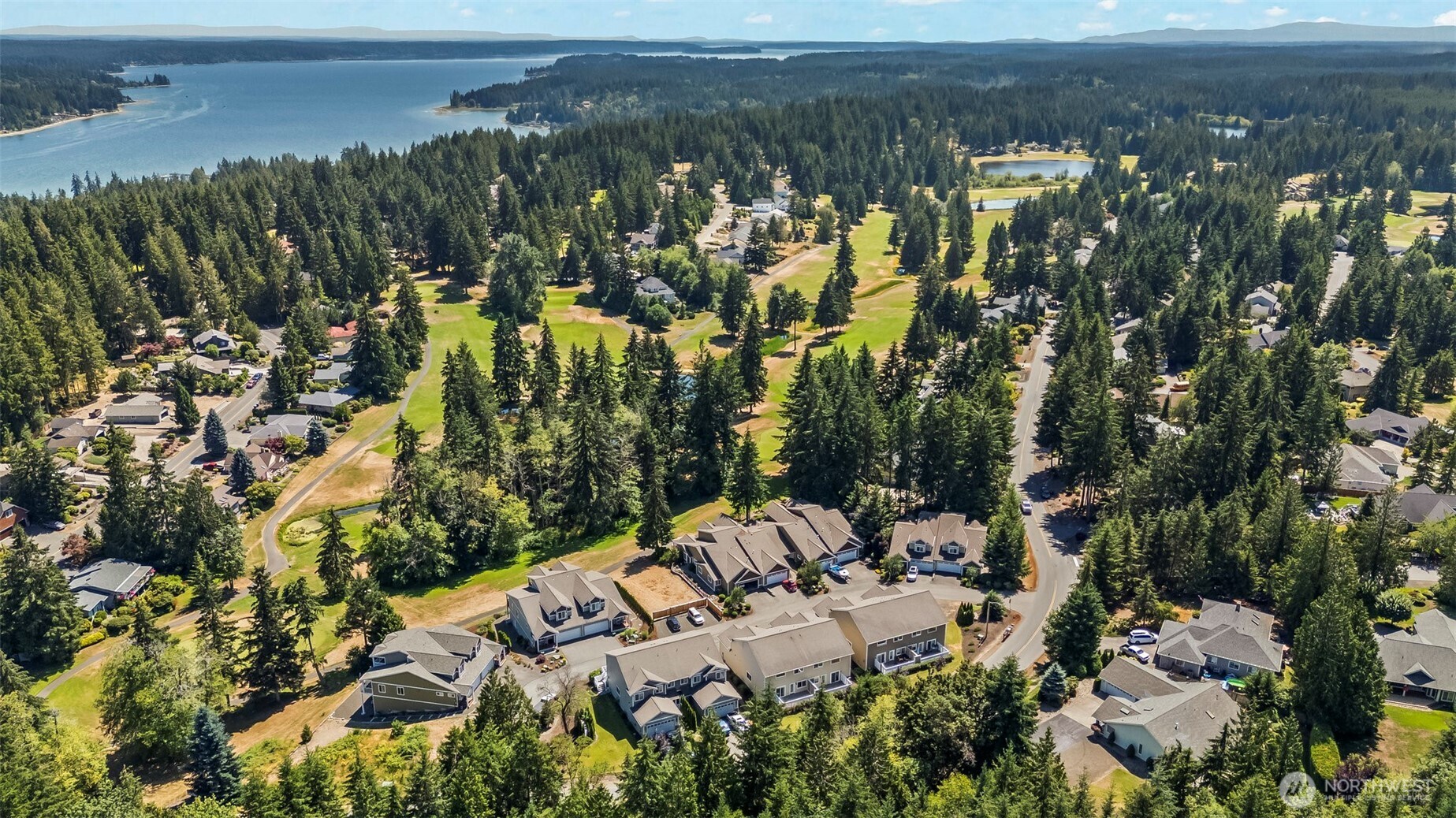 1080 East Old Ranch Road, Unit A1A2 Allyn, WA 98524 - Photo 6 of 35 a view of lake and yard