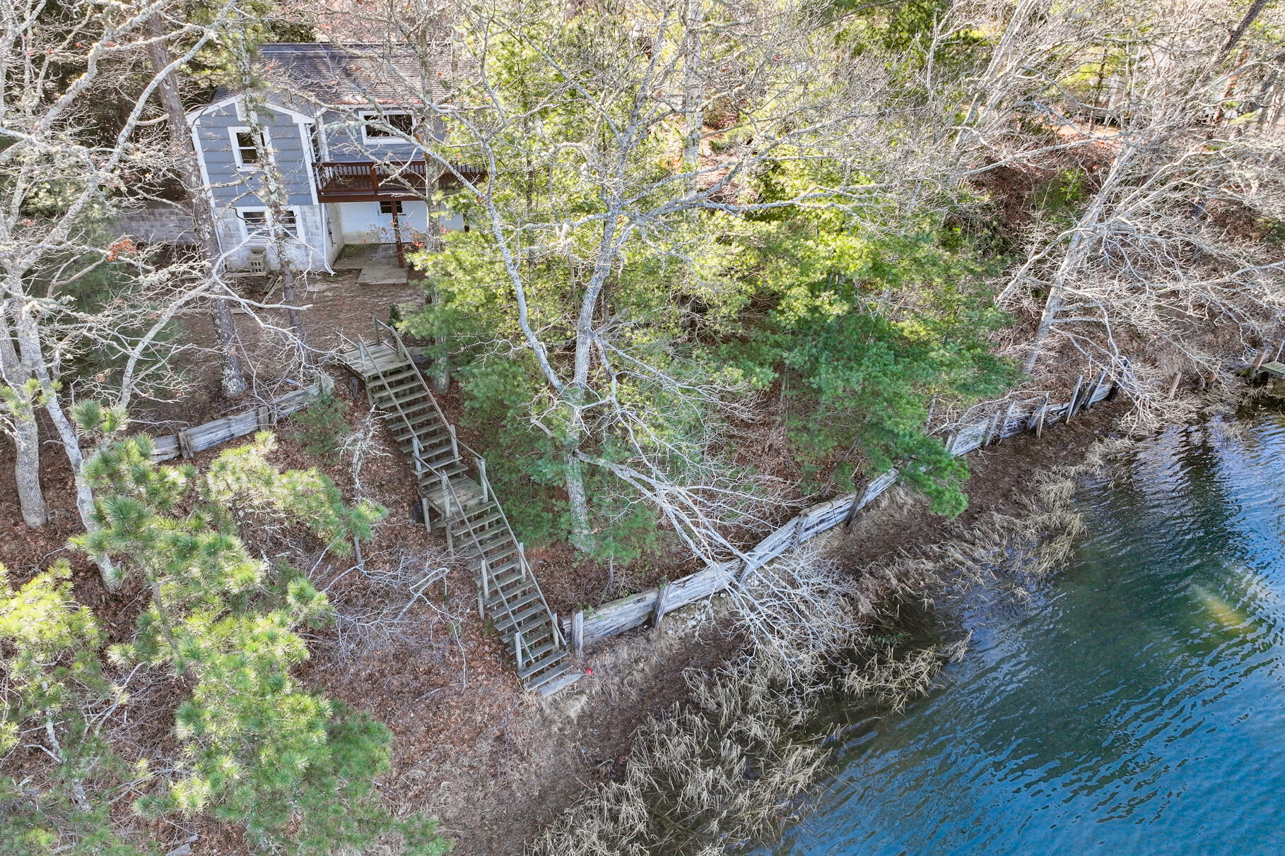71 Buccaneer Way Mashpee, MA 02649 - Photo 14 of 32 a aerial view of a house with a yard