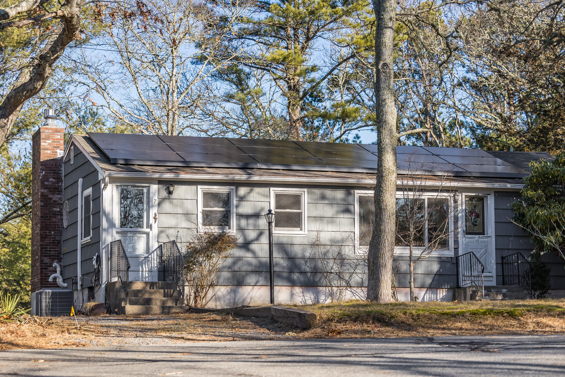 71 Buccaneer Way Mashpee, MA 02649 - Photo 4 of 32 a view of a house with a porch