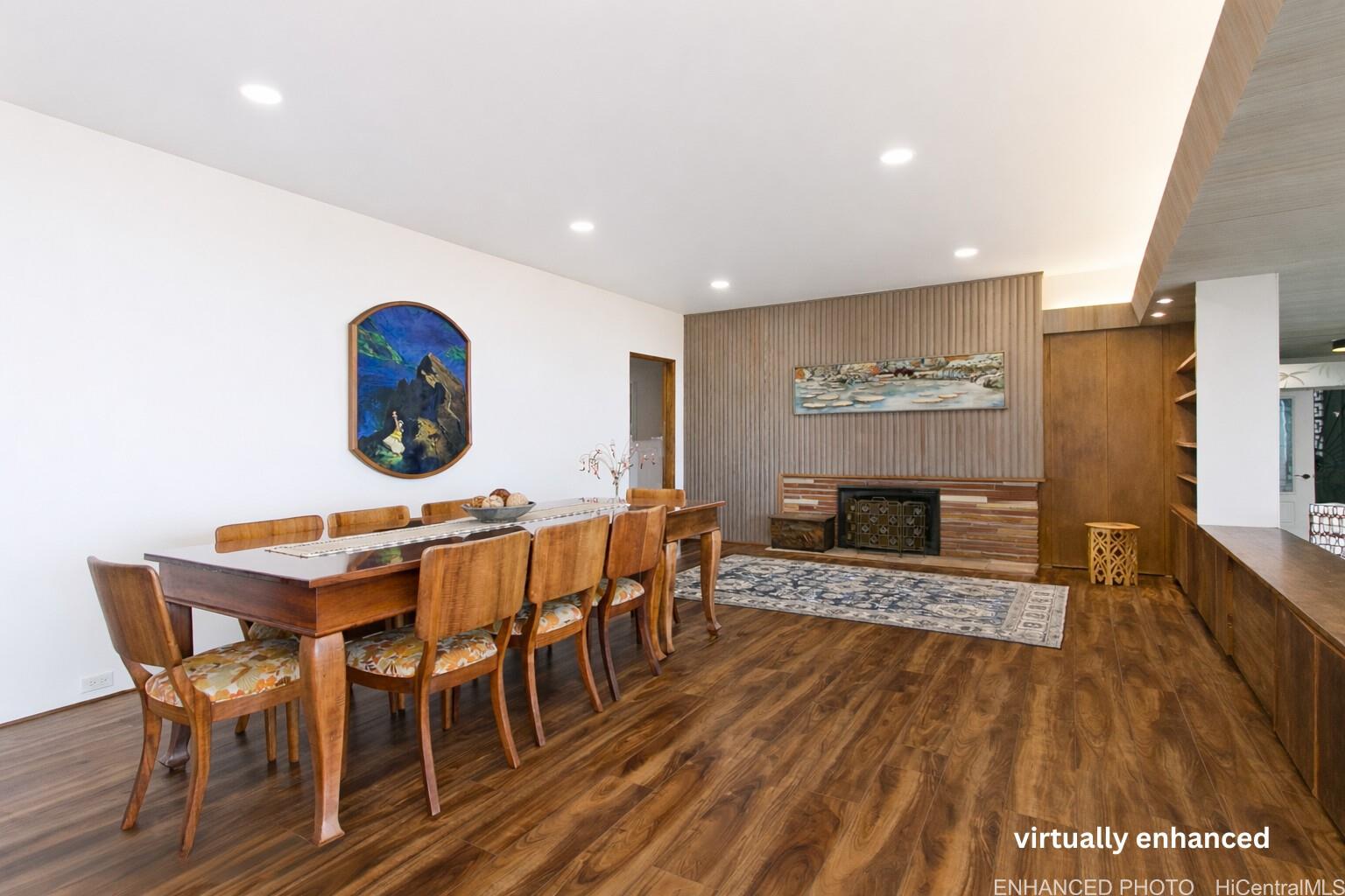 3233 Pacific Heights Road Honolulu, HI 96813 - Photo 5 of 25 a view of a dining room with furniture a rug and wooden floor