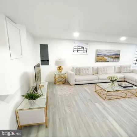 a living room with furniture and a couch