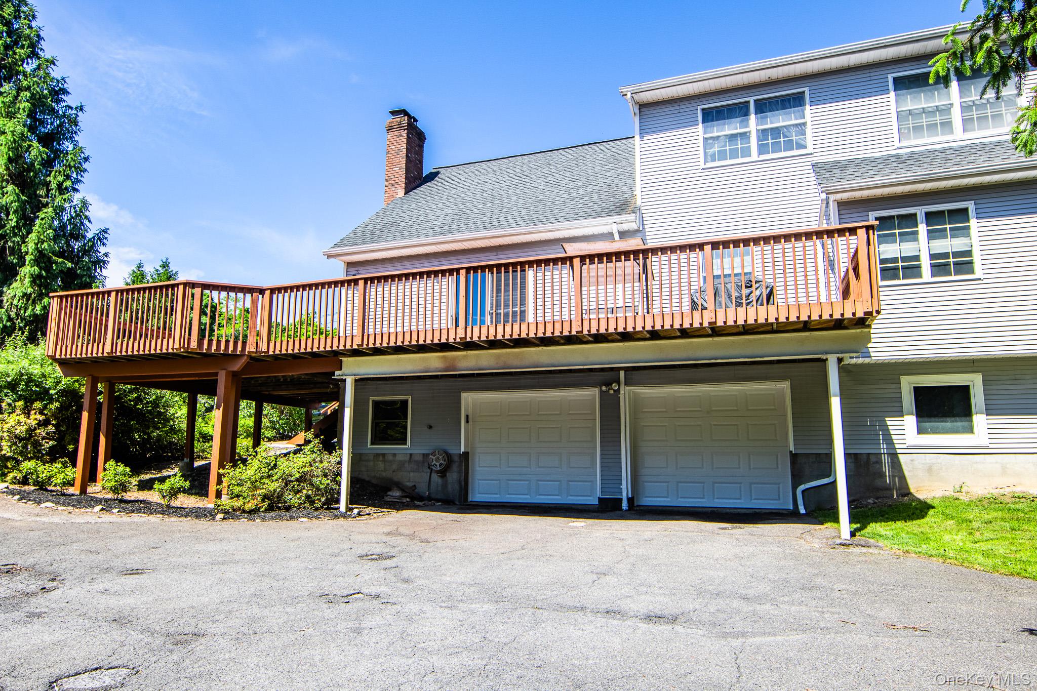214 West Mombasha Road Monroe, NY 10950 - Photo 37 of 43 a front view of a house with garden
