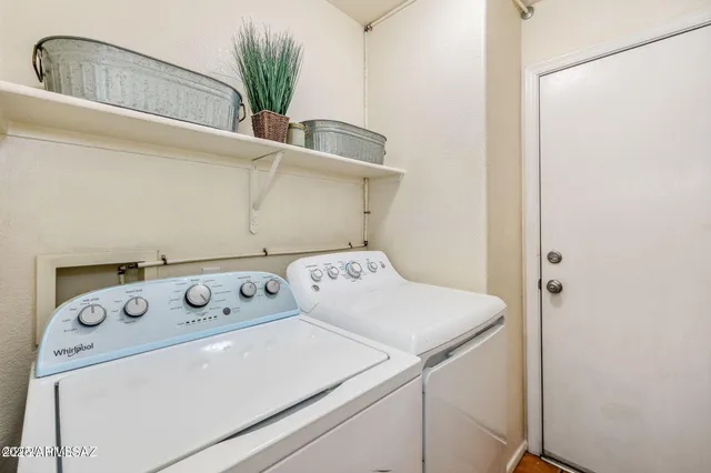 a view of a balcony with a floor to ceiling window and outside view