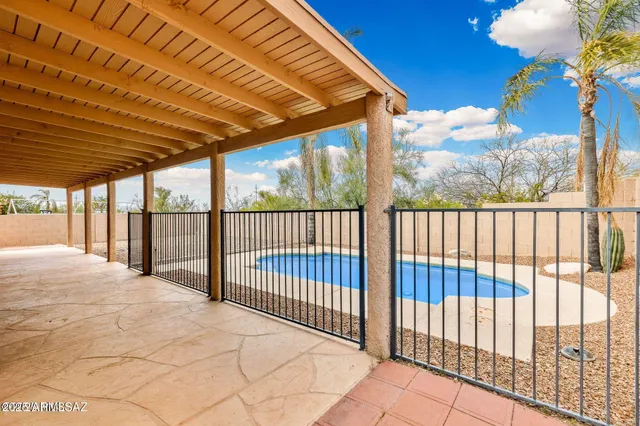 a view of outdoor space and swimming pool