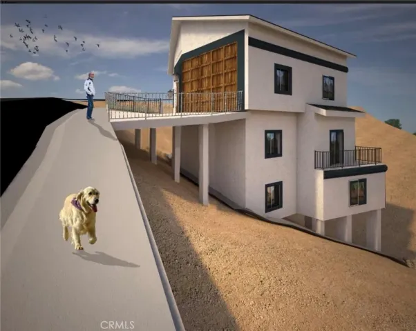 a view of a house with a backyard