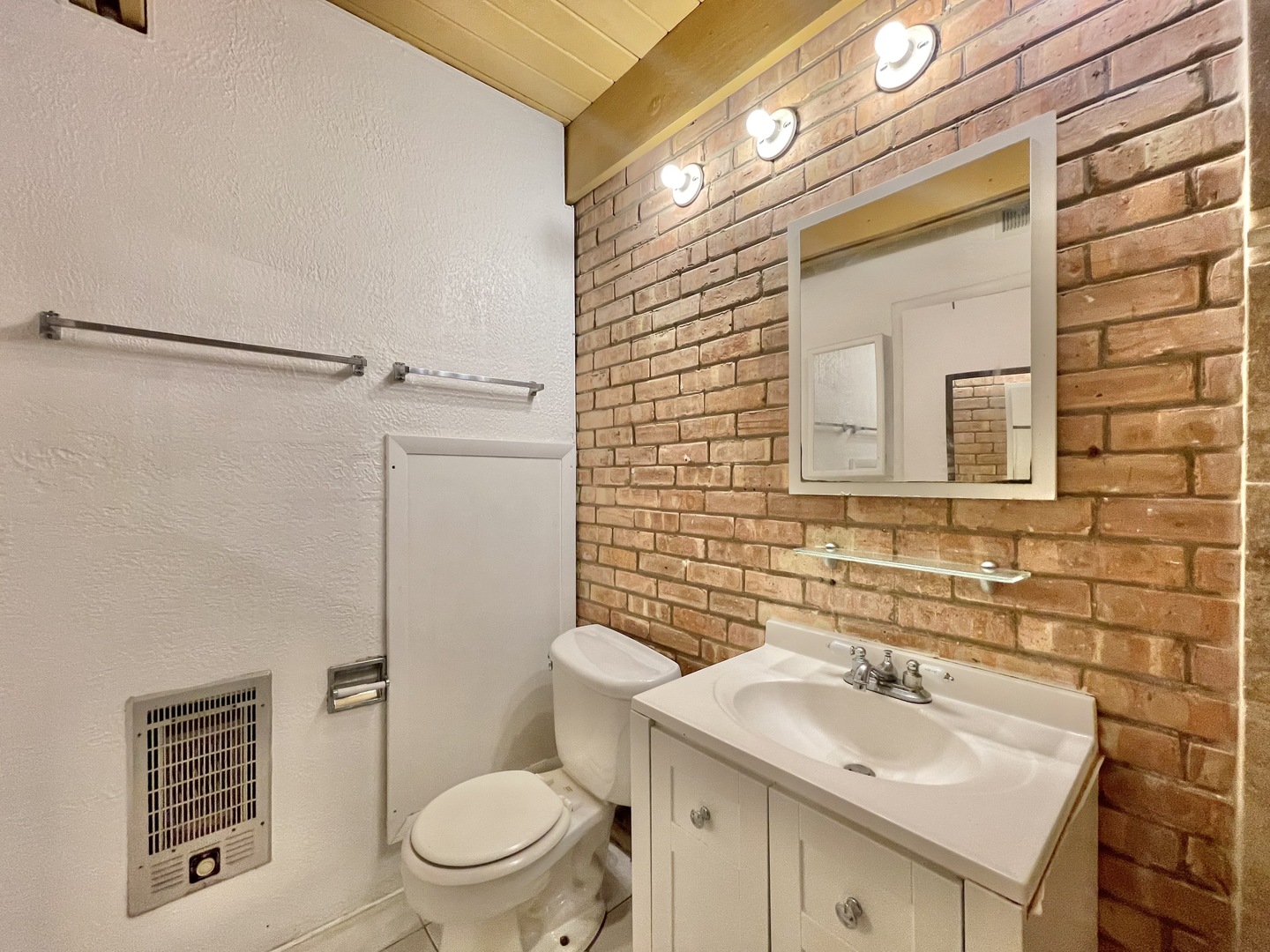 806 South Loomis Street, Unit B Chicago, IL 60607 - Photo 14 of 17 a bathroom with a sink toilet and shower