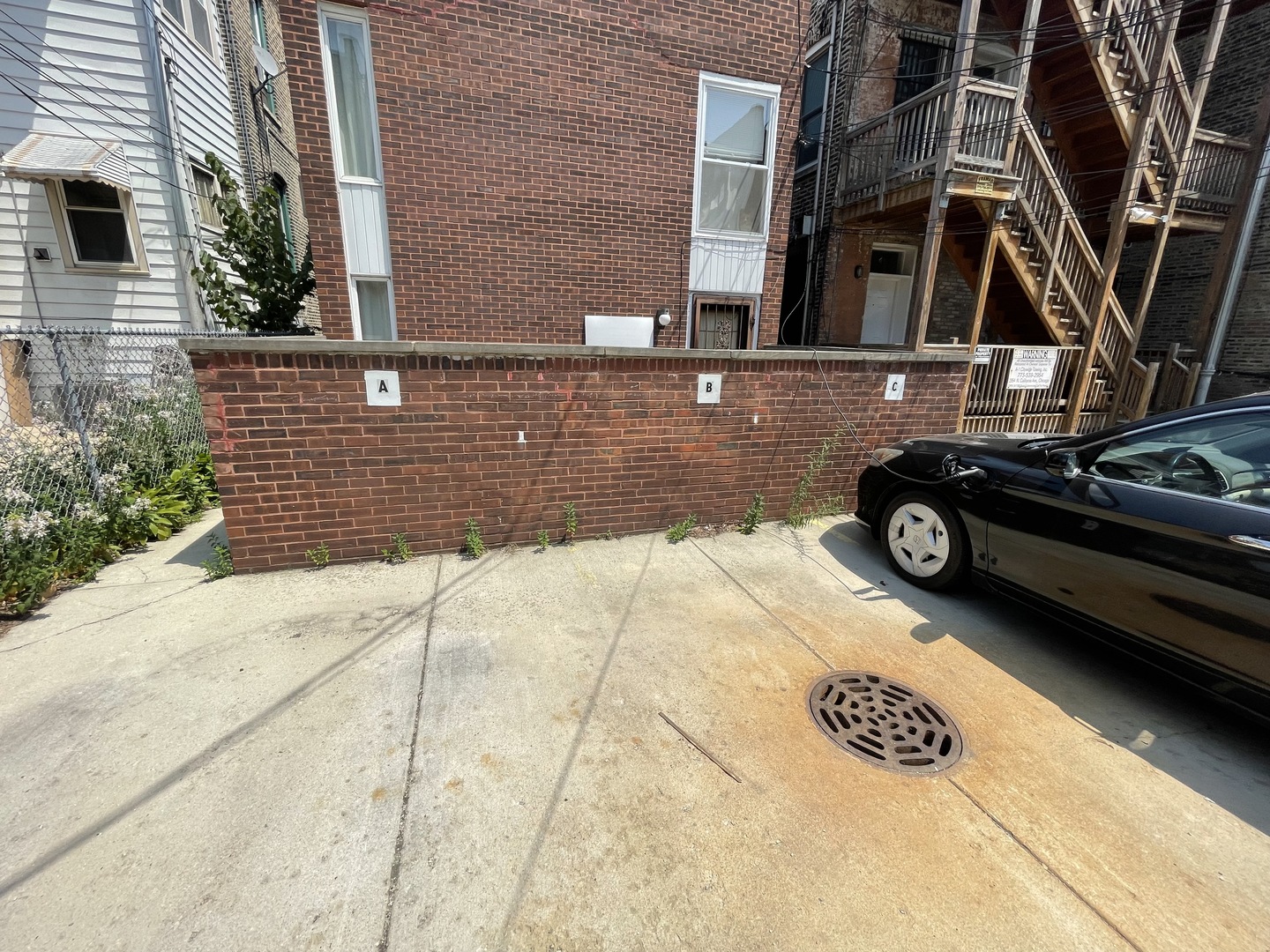 806 South Loomis Street, Unit B Chicago, IL 60607 - Photo 16 of 17 a view of a car park in front of a building
