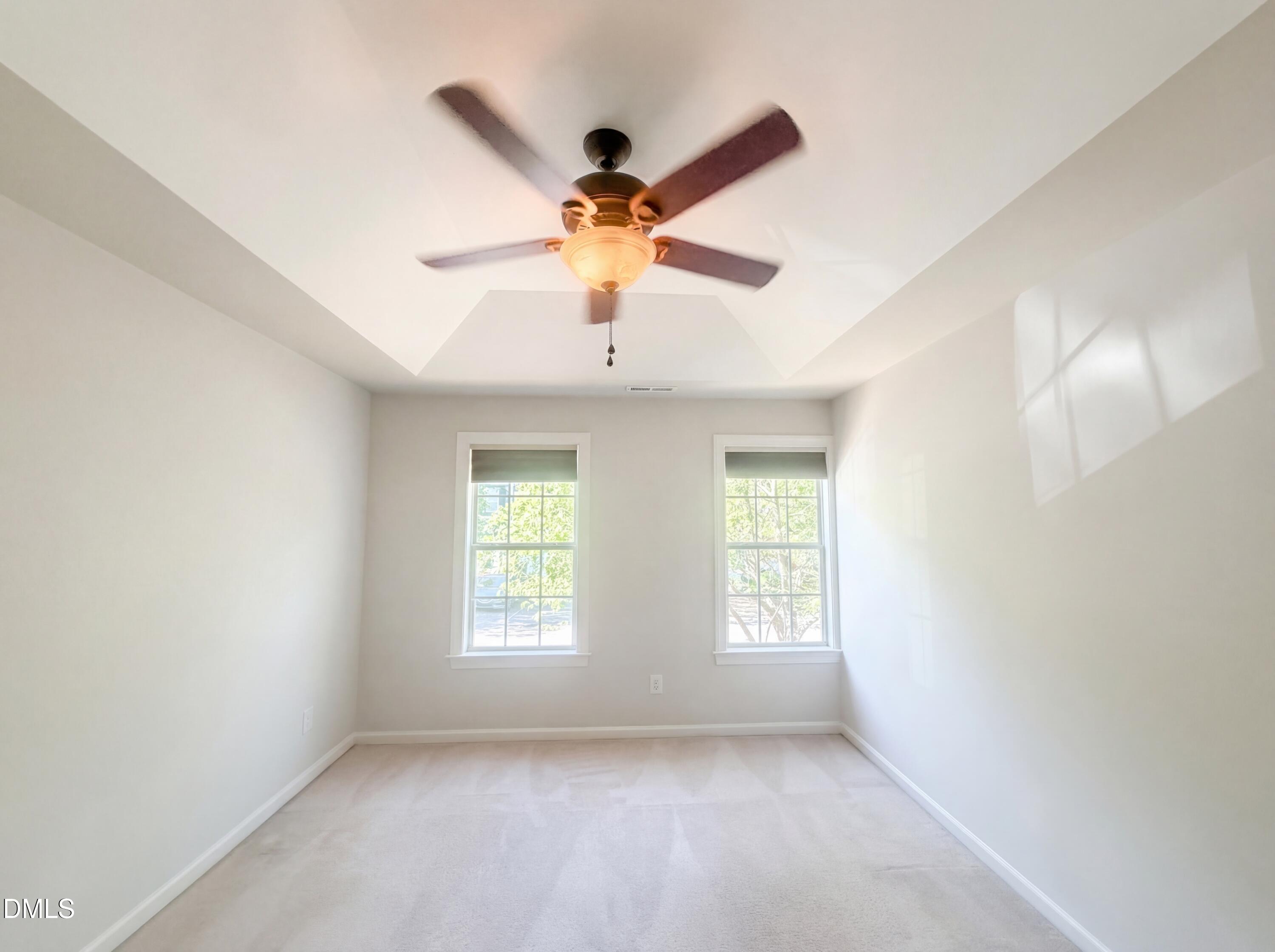 4321 Pine Springs Court Raleigh, NC 27613 - Photo 4 of 15 a view of room with a ceiling fan and window