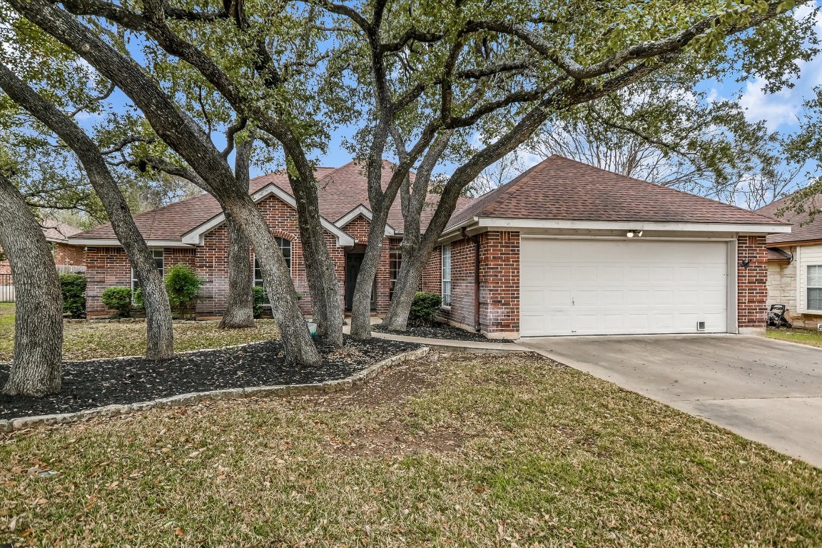 a house with trees in front of it