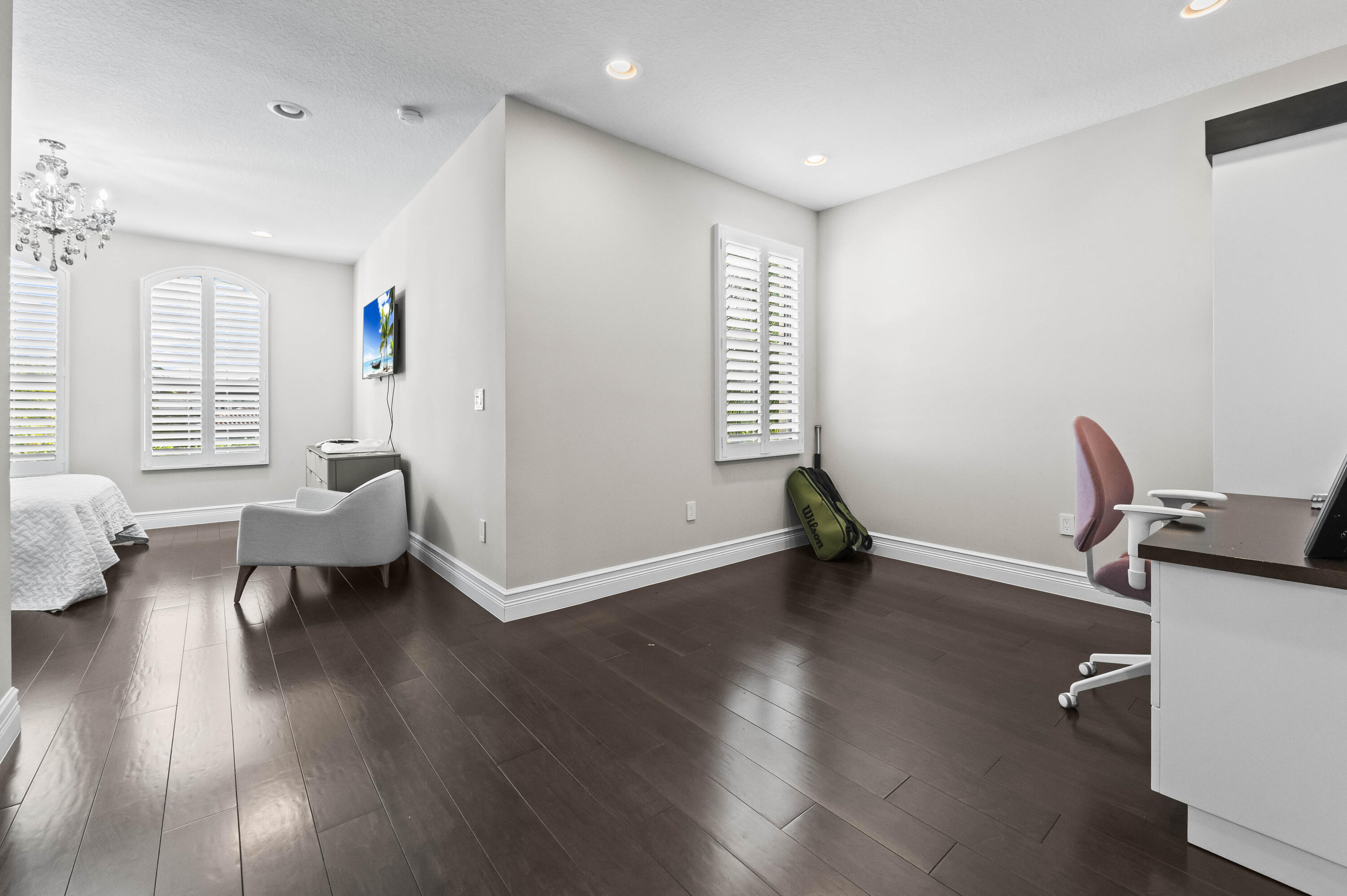 9795 Rennes Lane Delray Beach, FL 33446 - Photo 32 of 79 a view of a workspace with furniture and a window