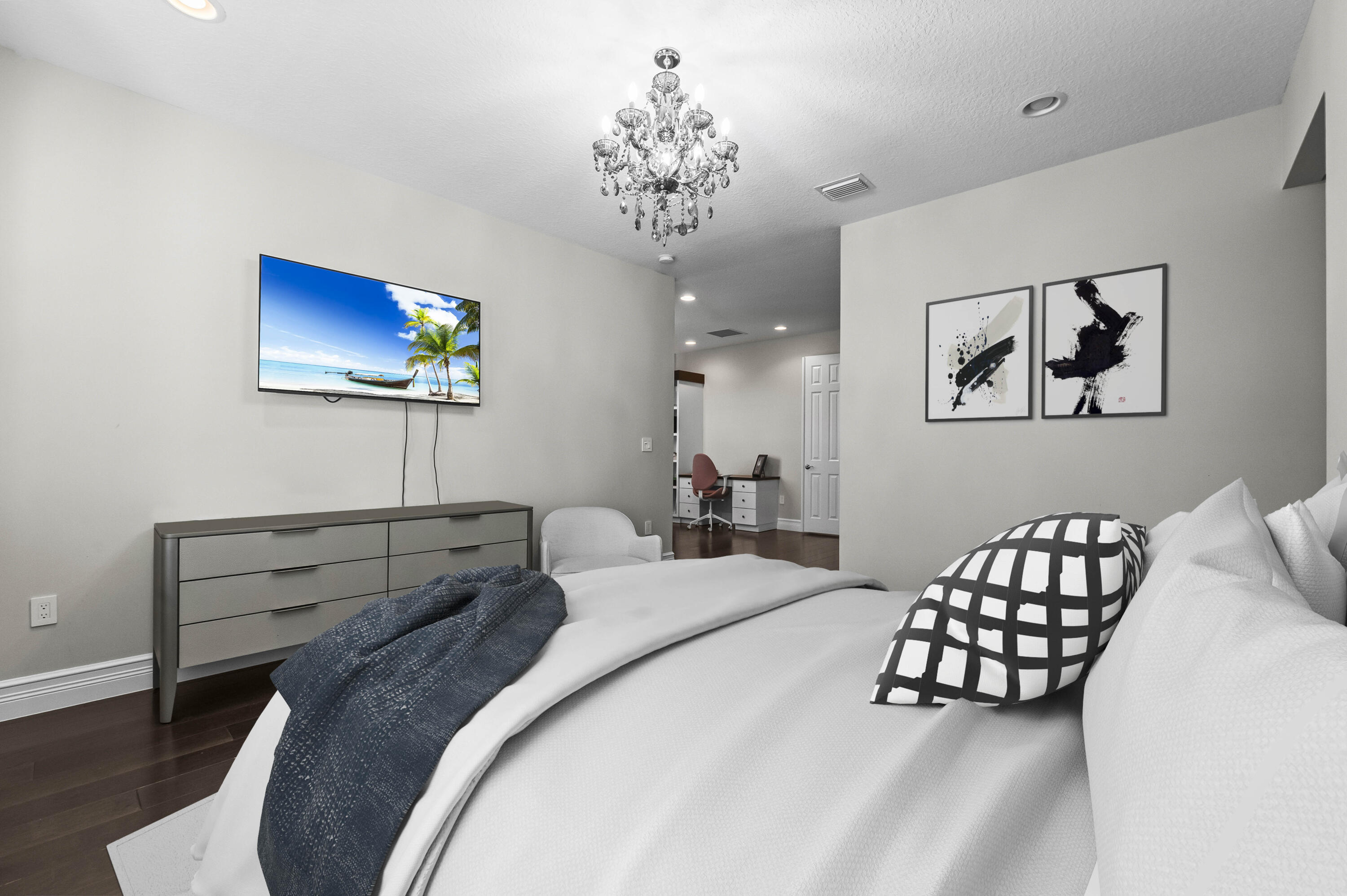 9795 Rennes Lane Delray Beach, FL 33446 - Photo 34 of 79 a bedroom with bed and a chandelier