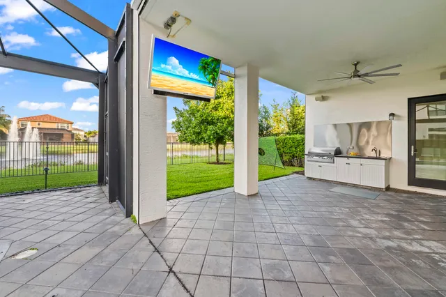 a view of a swimming pool with a patio