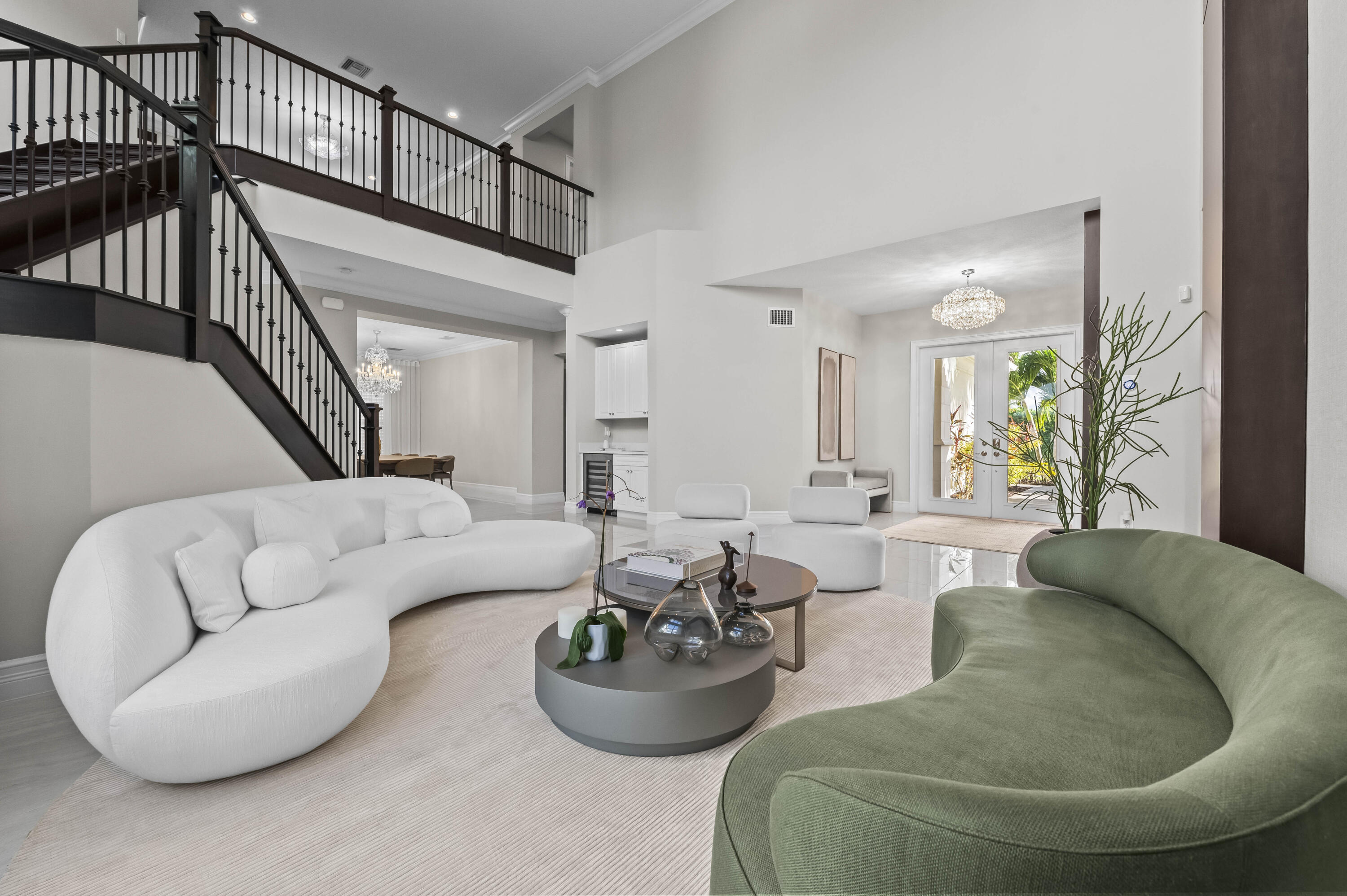 9795 Rennes Lane Delray Beach, FL 33446 - Photo 5 of 79 a living room with furniture and a potted plant