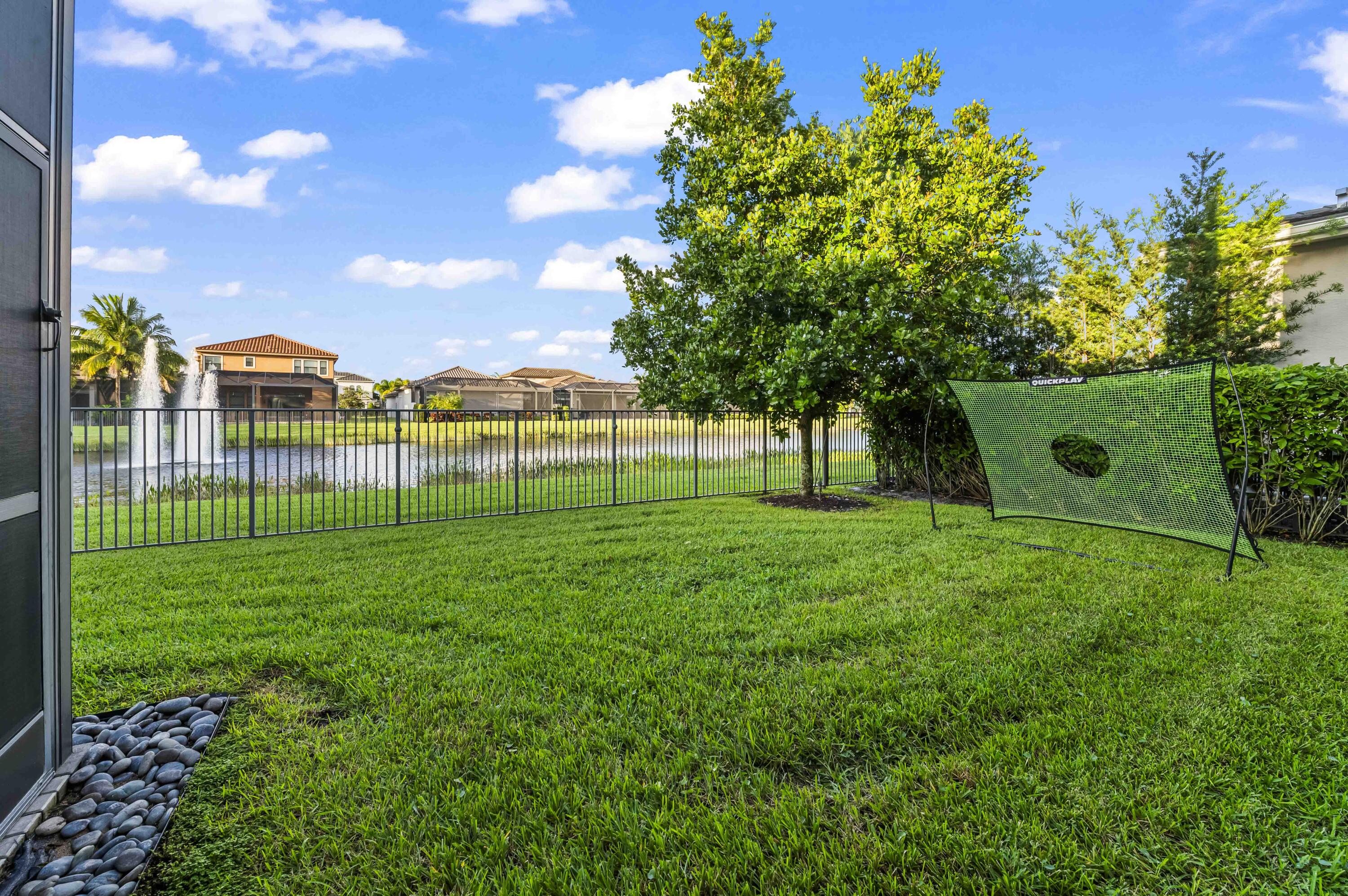 9795 Rennes Lane Delray Beach, FL 33446 - Photo 54 of 79 a view of a park with a tree