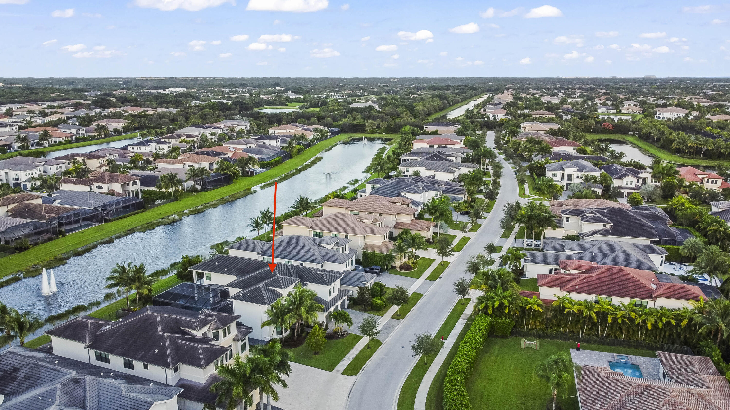9795 Rennes Lane Delray Beach, FL 33446 - Photo 58 of 79 an aerial view of residential houses with outdoor space and river