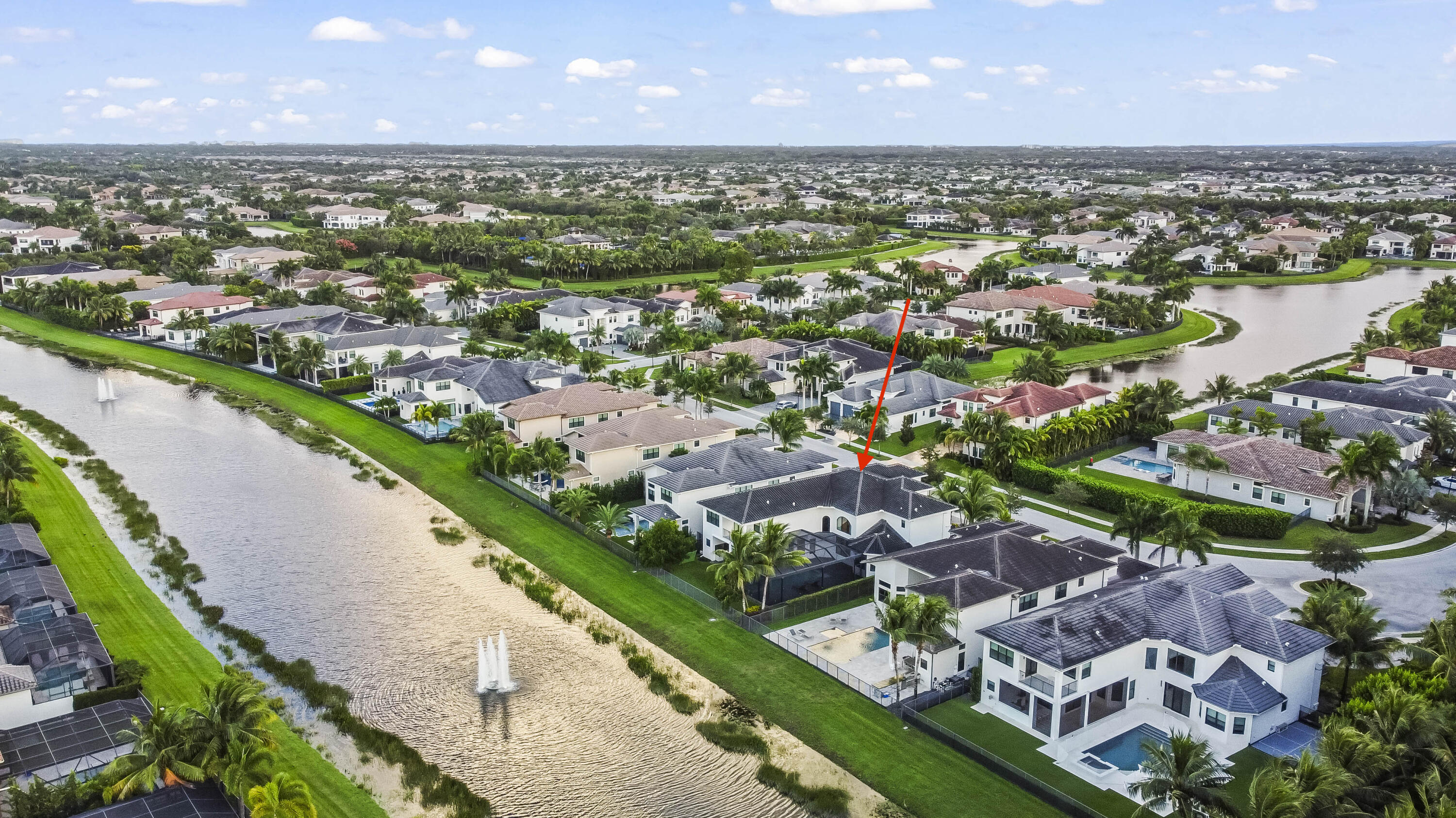 9795 Rennes Lane Delray Beach, FL 33446 - Photo 60 of 79 an aerial view of residential houses with outdoor space and lake view