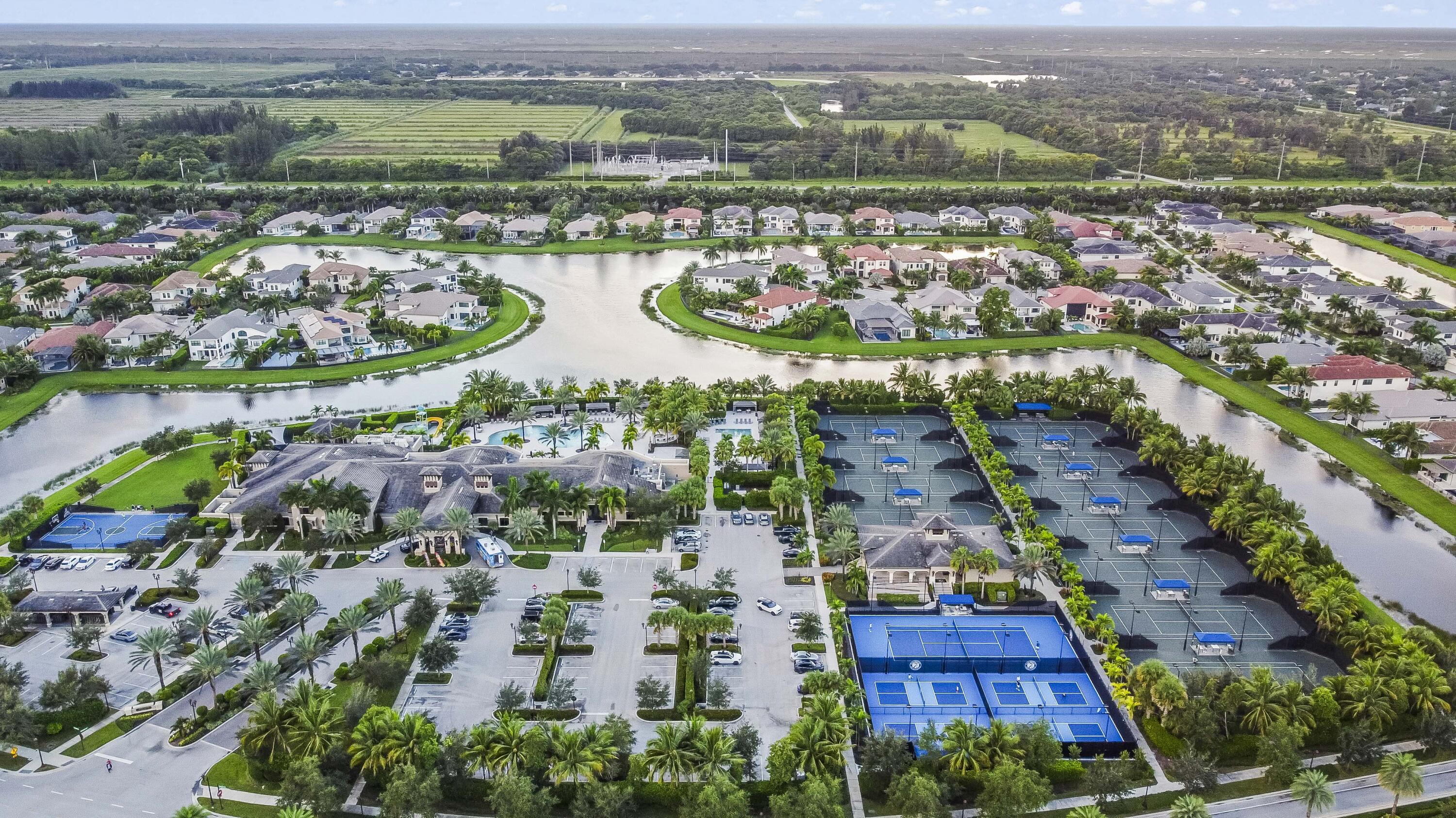 9795 Rennes Lane Delray Beach, FL 33446 - Photo 67 of 79 an aerial view of lake residential houses with outdoor space