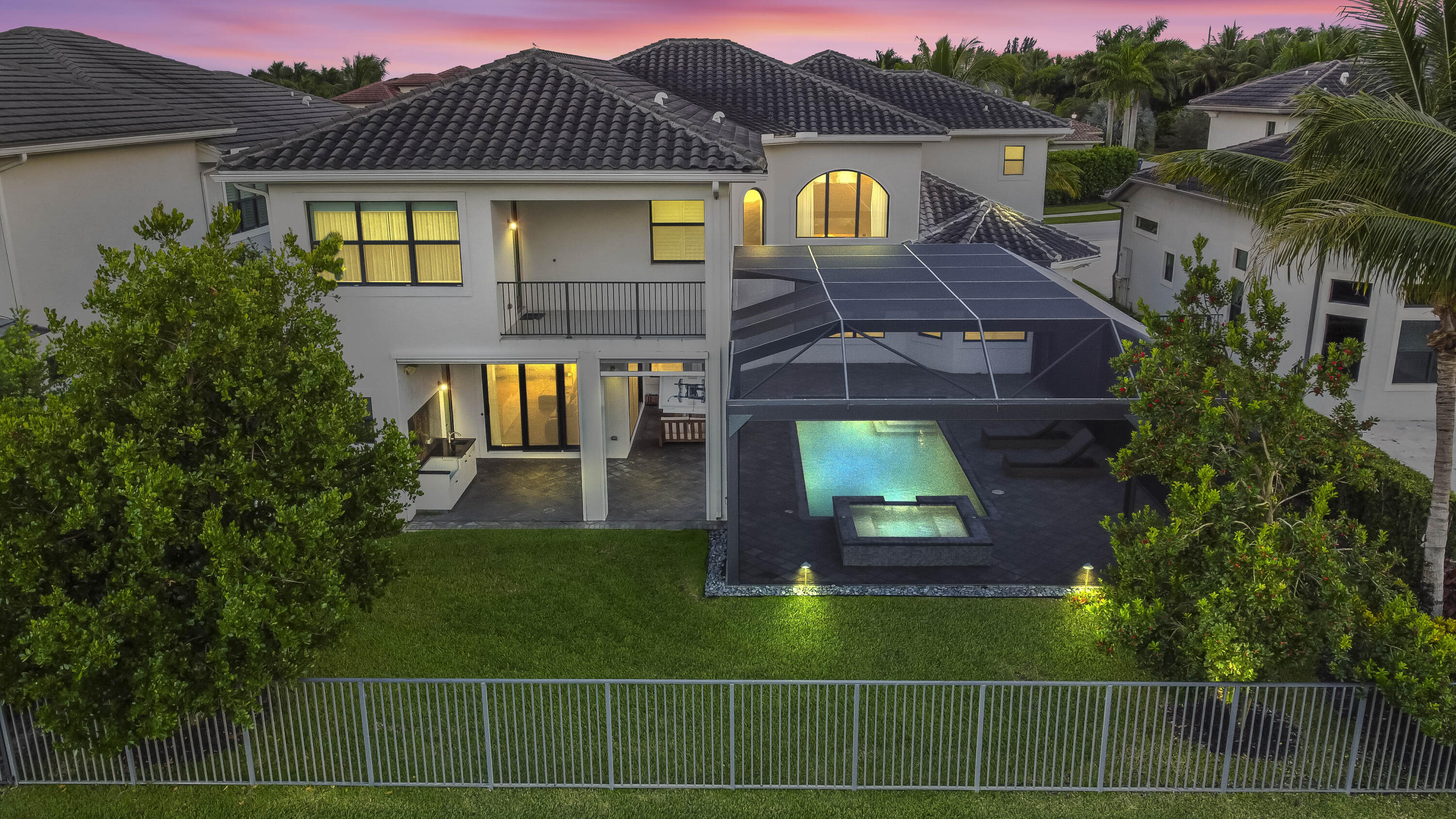 9795 Rennes Lane Delray Beach, FL 33446 - Photo 76 of 79 a front view of a house with a garden
