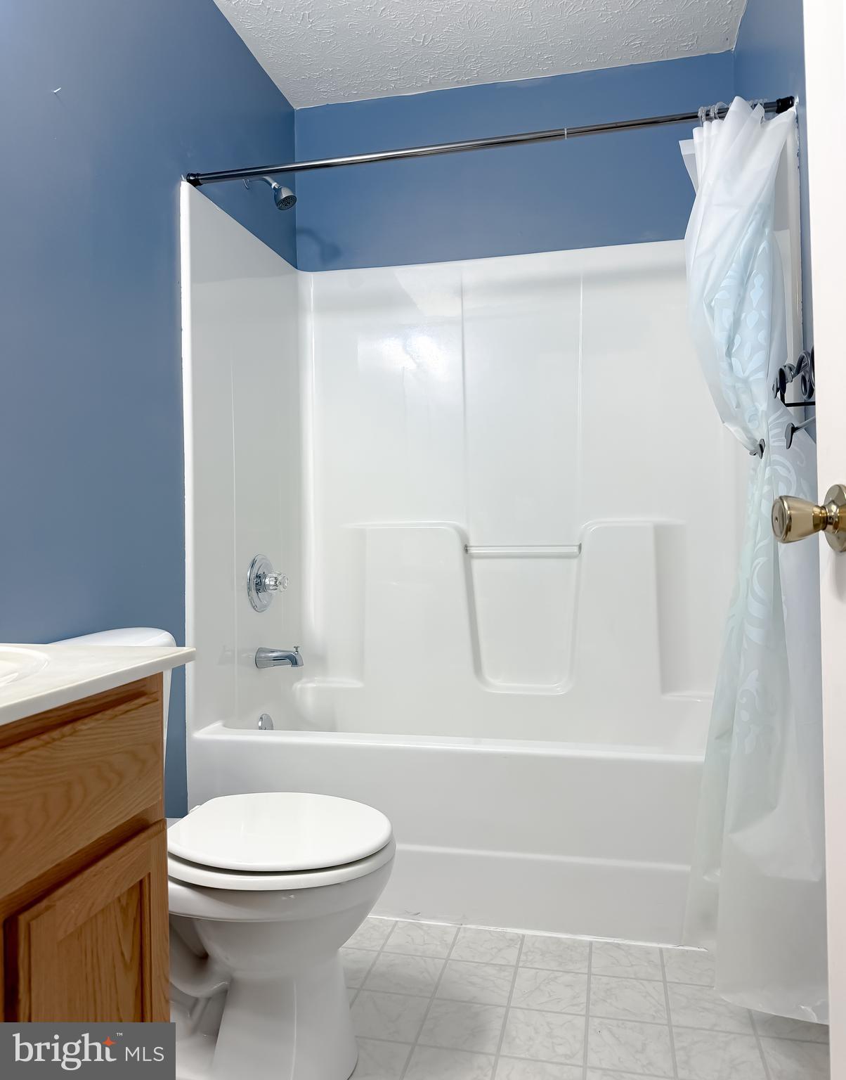 23801 McIntosh Road Hollywood, MD 20636 - Photo 24 of 35 a bathroom with a toilet and a shower