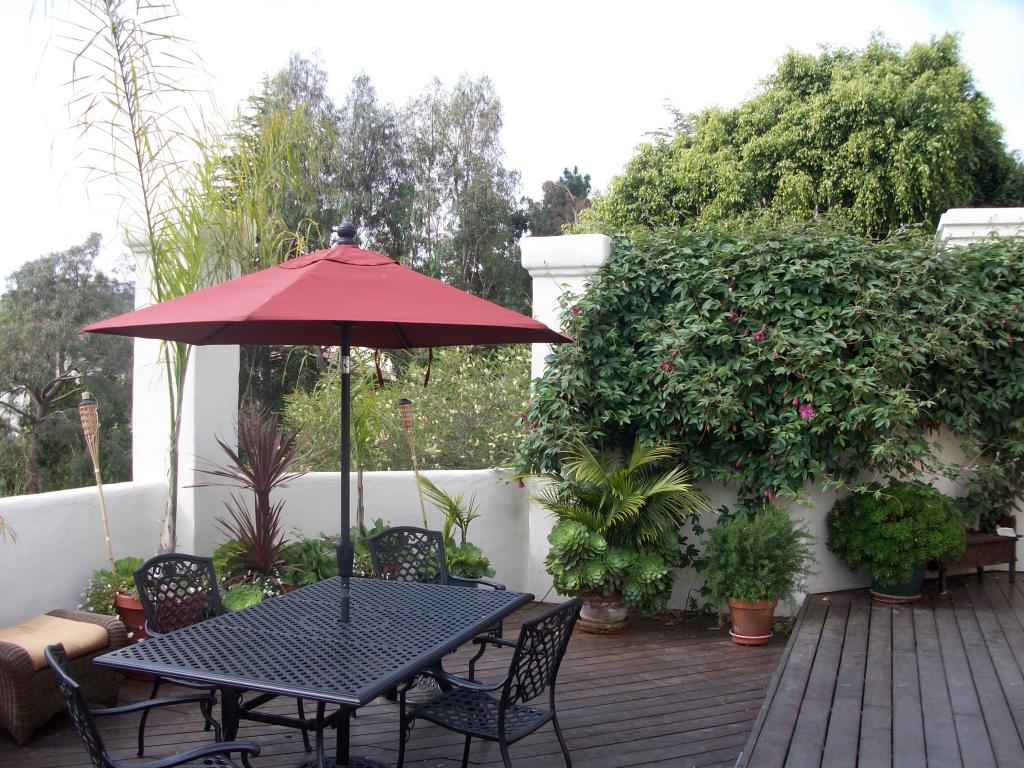 855 Miramonte Drive Santa Barbara, CA 93109 - Photo 15 of 25 a view of a patio with furniture and wooden floor