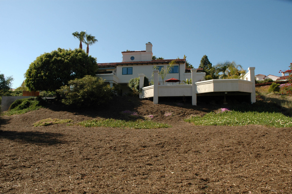 855 Miramonte Drive Santa Barbara, CA 93109 - Photo 21 of 25 a car parked in front of a yard