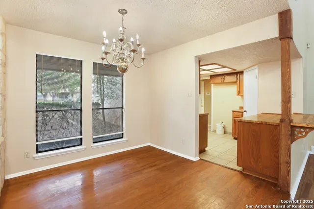 a view of a chandelier in a room