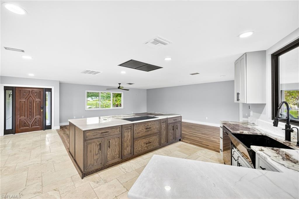 18071 Traverse Drive Alva, FL 33920 - Photo 11 of 50 a kitchen with a sink and cabinets