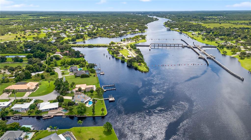 18071 Traverse Drive Alva, FL 33920 - Photo 45 of 50 an aerial view of residential houses with outdoor space