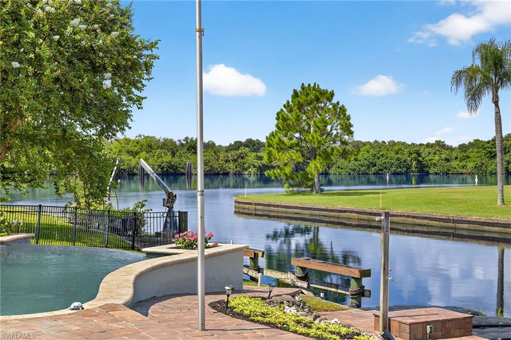 18071 Traverse Drive Alva, FL 33920 - Photo 48 of 50 a view of a house with a backyard and swimming pool