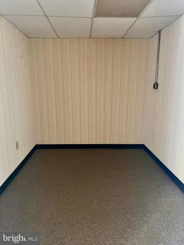 a view of a room with a window