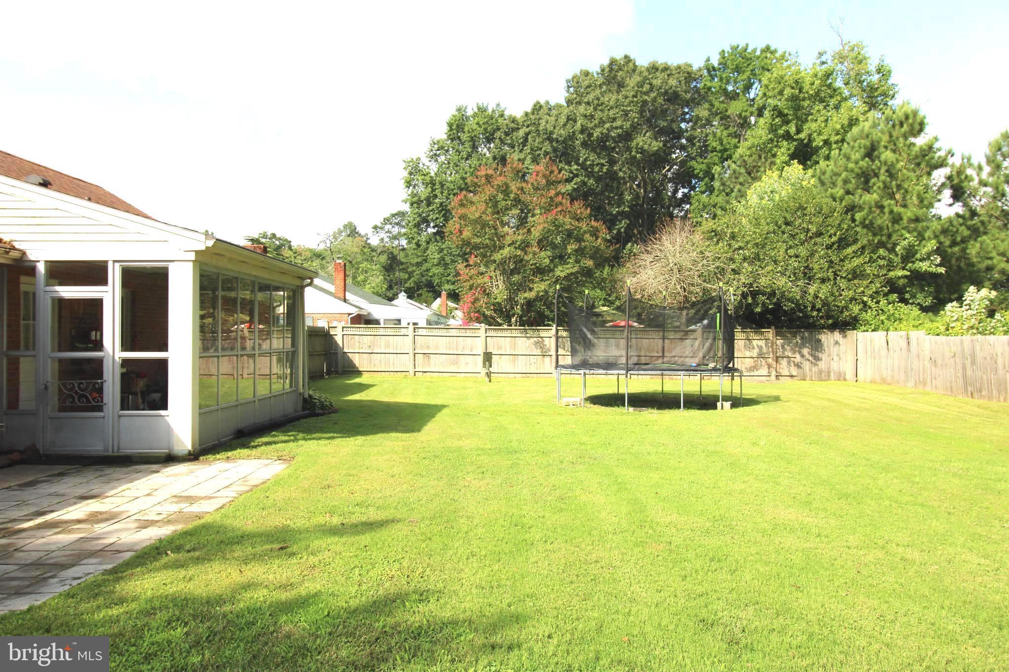 601 Edlon Park Cambridge, MD 21613 - Photo 5 of 19 a view of a swimming pool with an outdoor space and seating area
