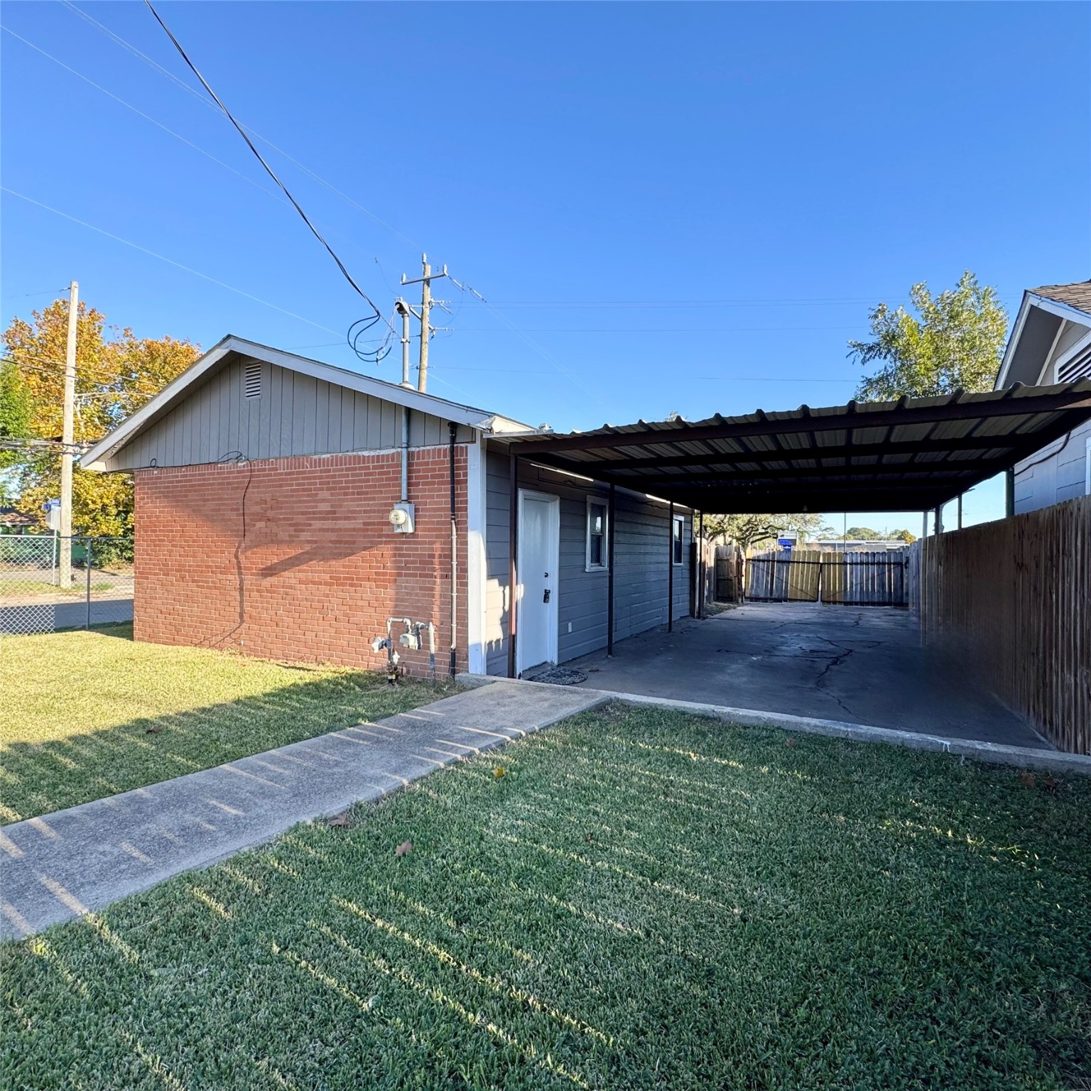 416 Casey Street, Unit 1/2 Baytown, TX 77520 - Photo 1 of 6 a view of a house with a yard