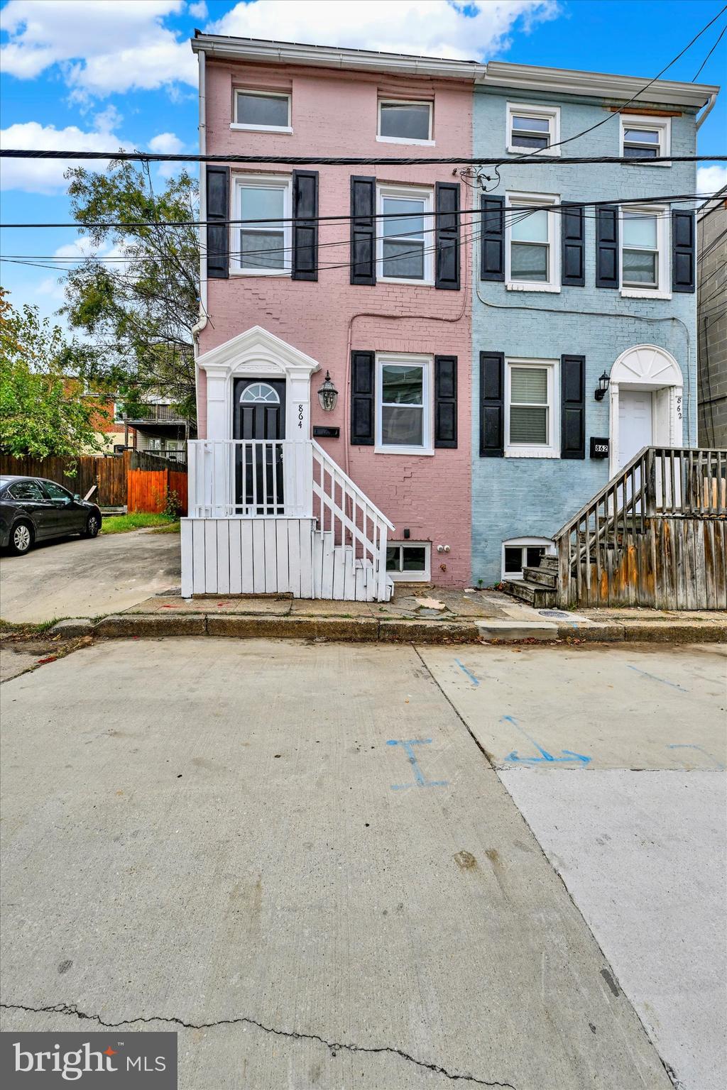 864 Lemmon Street Baltimore, MD 21201 - Photo 18 of 18 a front view of a house with a yard