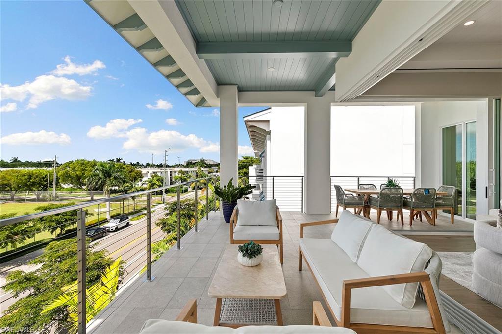 201 8th Street South, Unit 301 Naples, FL 34102 - Photo 17 of 43 a outdoor view with a sitting space