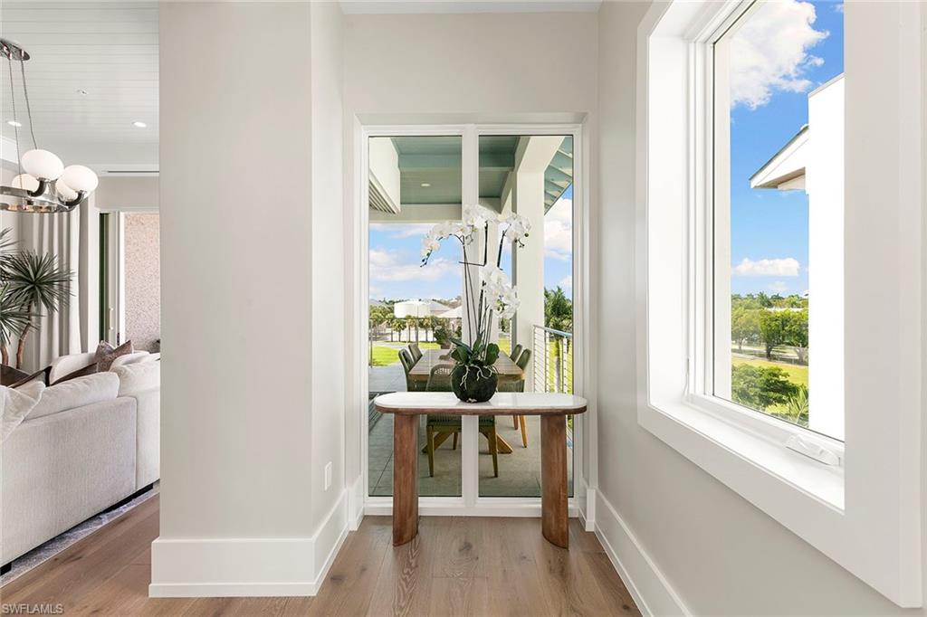 201 8th Street South, Unit 301 Naples, FL 34102 - Photo 29 of 43 a dining room with furniture and window