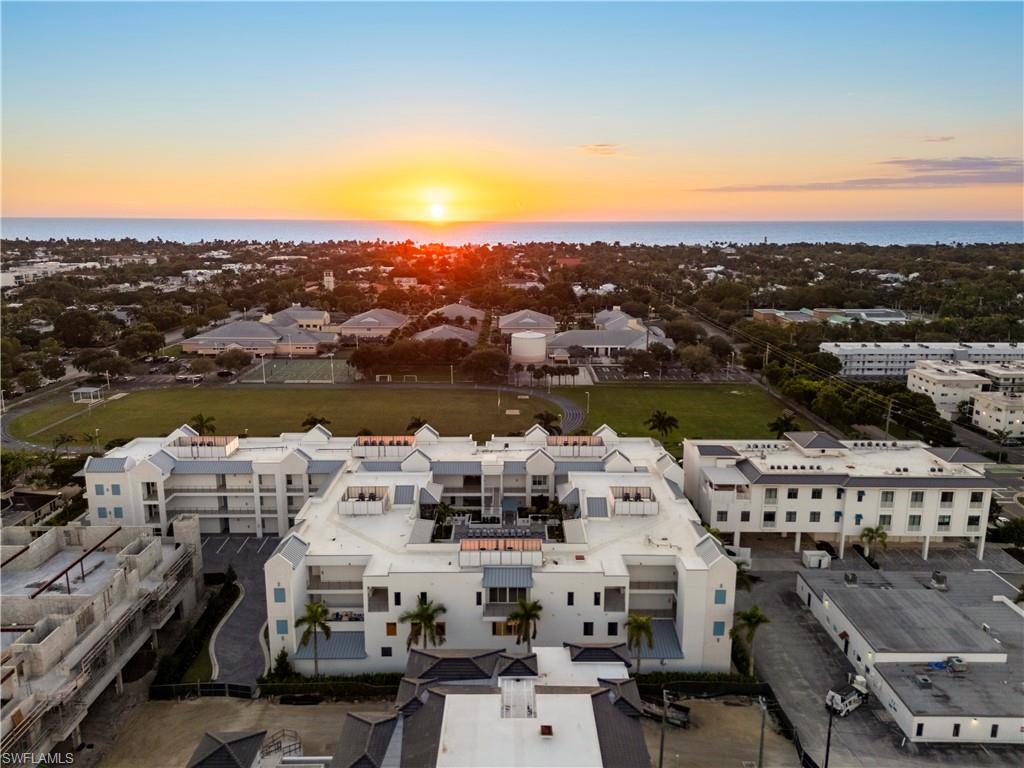 201 8th Street South, Unit 301 Naples, FL 34102 - Photo 39 of 43 a picture of city view with lake view and mountain view