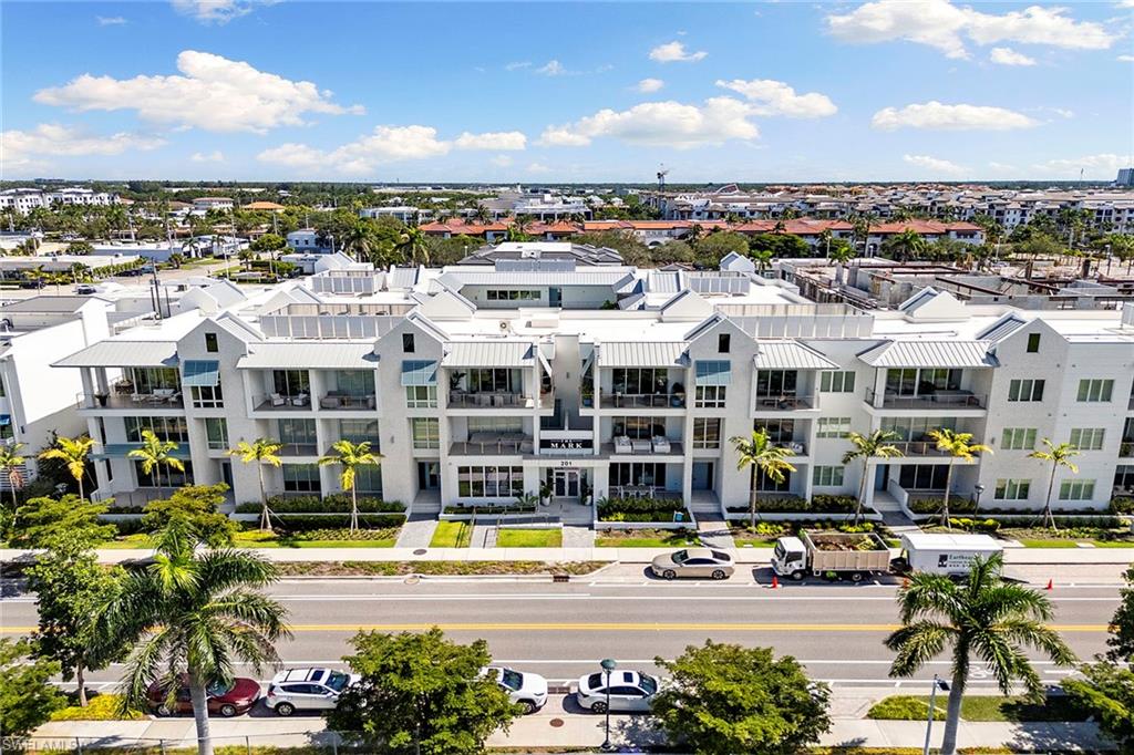 201 8th Street South, Unit 301 Naples, FL 34102 - Photo 41 of 43 a view of city with tall buildings
