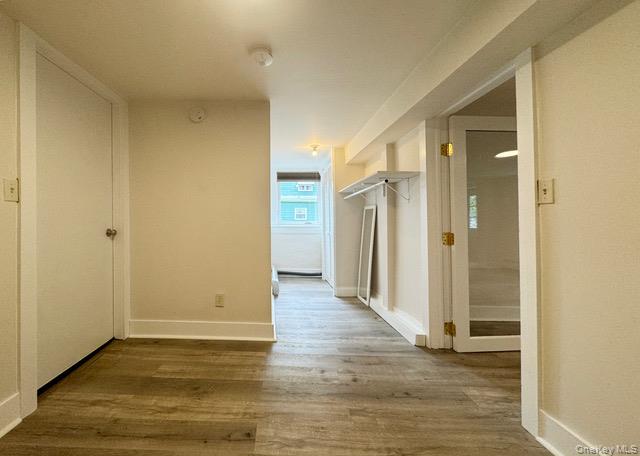 12 Grove Street, Unit C Beacon, NY 12508 - Photo 12 of 13 Hall with wood finished floors and baseboards