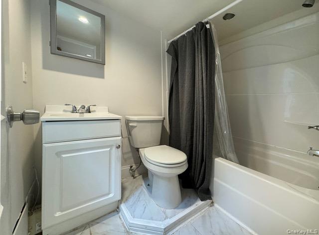 12 Grove Street, Unit C Beacon, NY 12508 - Photo 5 of 13 Bathroom with light marble finish flooring, shower / bath combo, and vanity