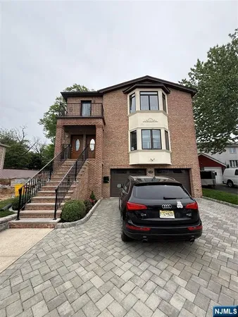 a car parked in front of a house