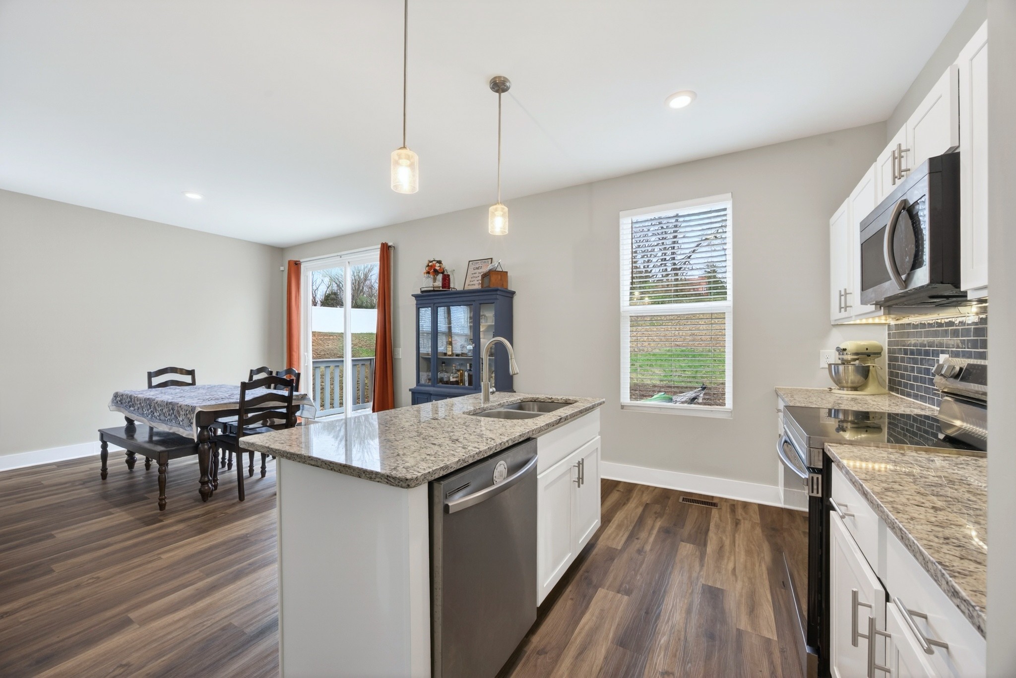 2030 Morgan Court Springfield, TN 37172 - Photo 12 of 29 a living room with stainless steel appliances granite countertop furniture wooden floor and a window