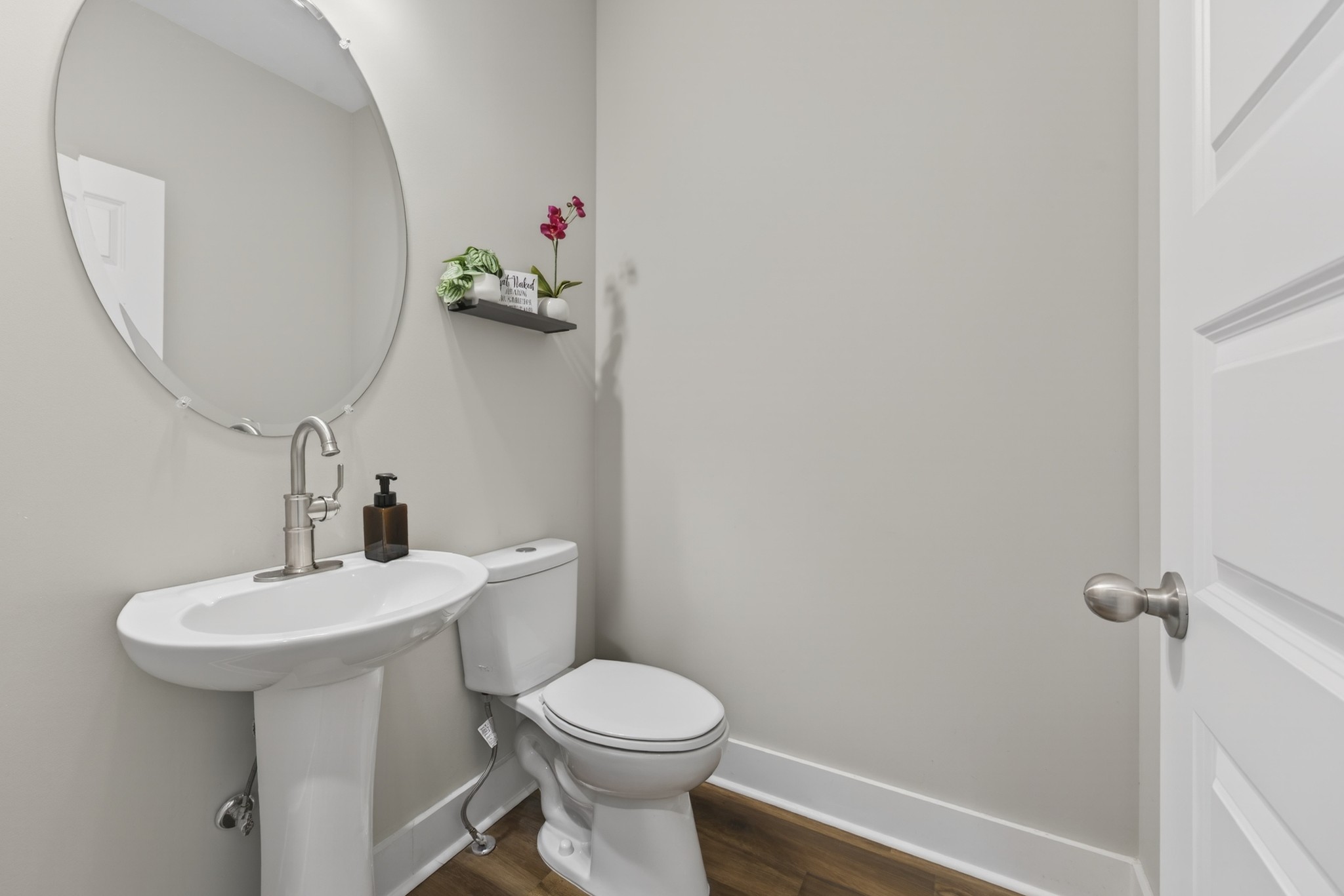 2030 Morgan Court Springfield, TN 37172 - Photo 16 of 29 a bathroom with a sink toilet and a mirror