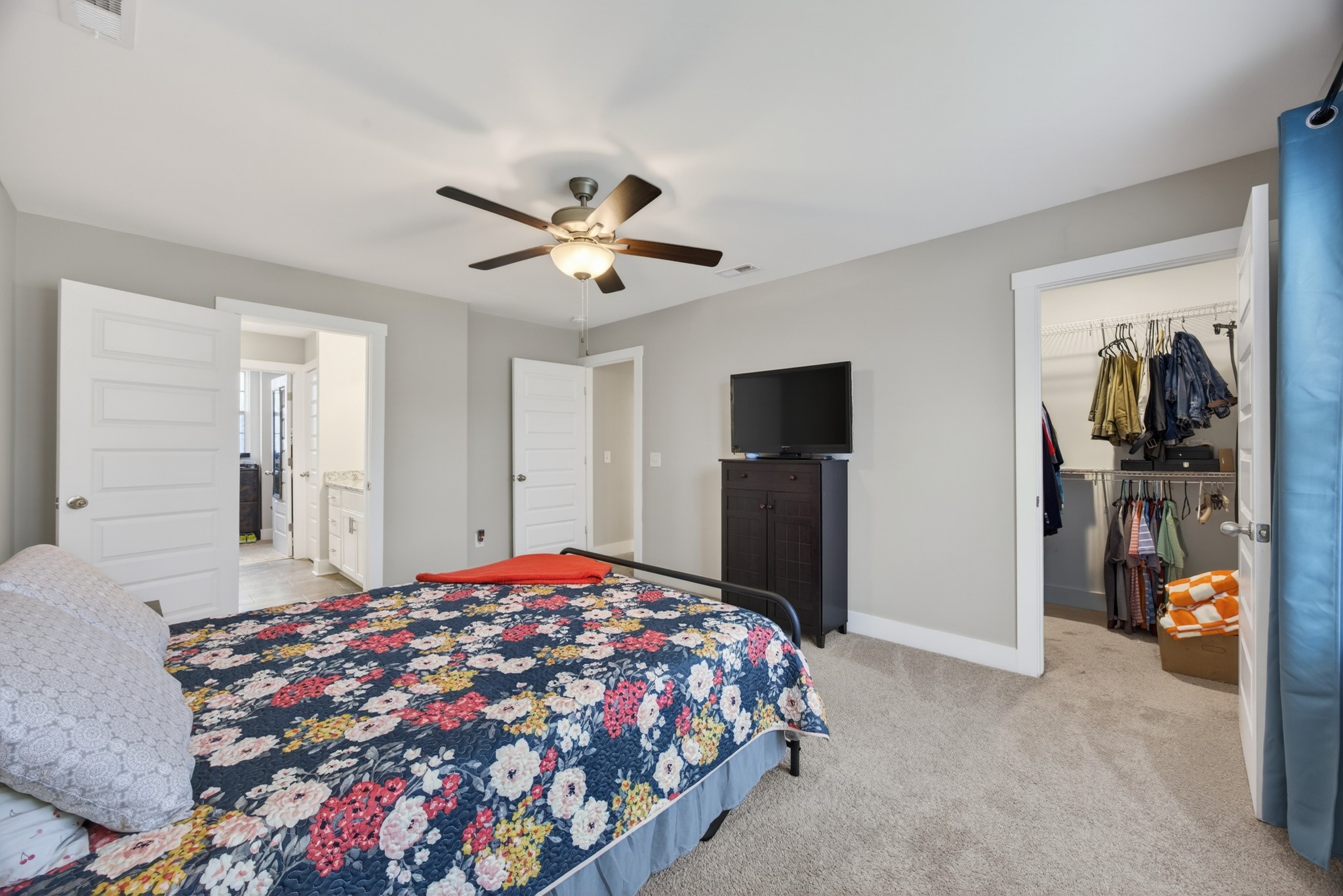 2030 Morgan Court Springfield, TN 37172 - Photo 19 of 29 a bedroom with a bed and a chandelier