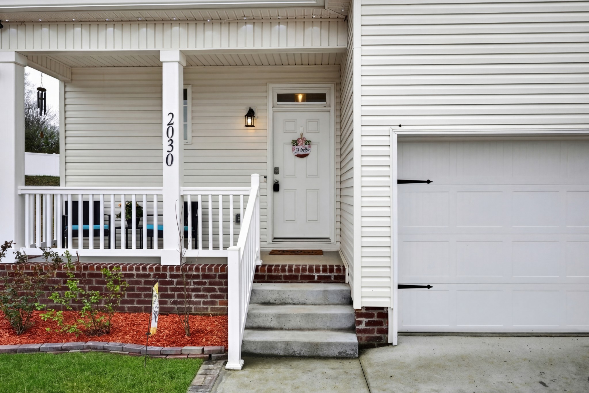 2030 Morgan Court Springfield, TN 37172 - Photo 5 of 29 a view of a house with a door and a yard with wooden fence