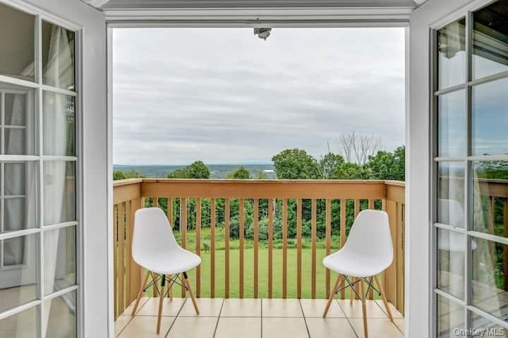 73 Mountain Road Bloomingburg, NY 12721 - Photo 11 of 19 a view of a balcony with chairs